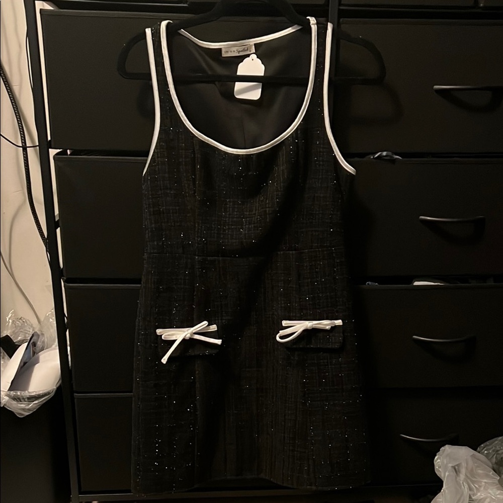 Elegant Black Dress with White Accents